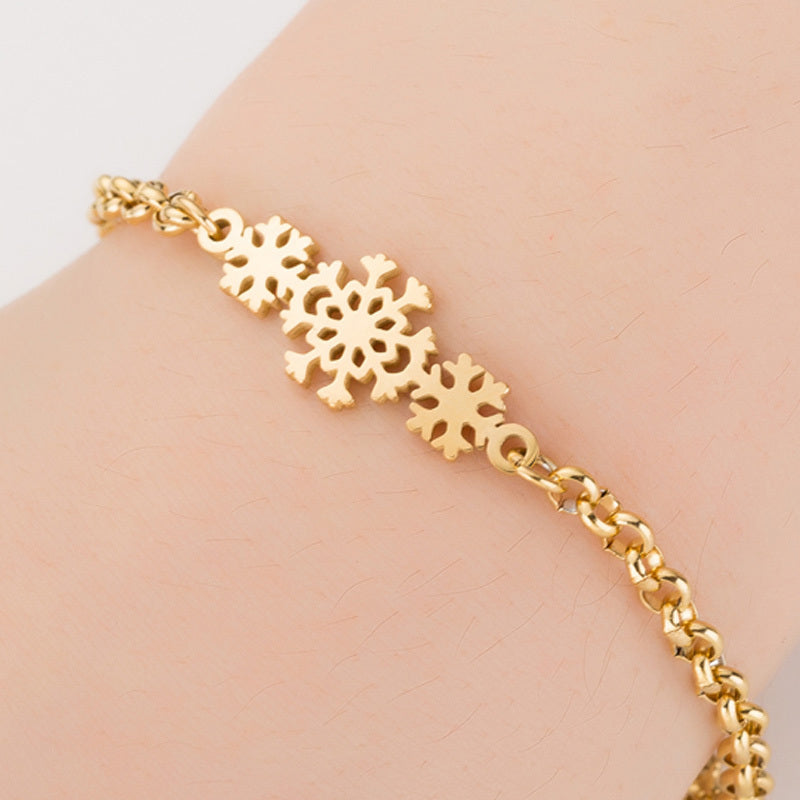 **Bracelet femme en acier inoxydable or, éléphant origami porte-bonheur**.