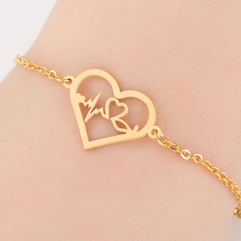 **Bracelet femme en acier inoxydable or, éléphant origami porte-bonheur**.
