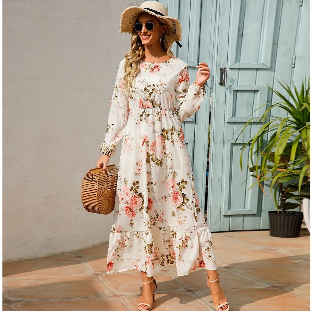 Robe maxi bohème imprimé floral, manches longues, idéale printemps-été.
