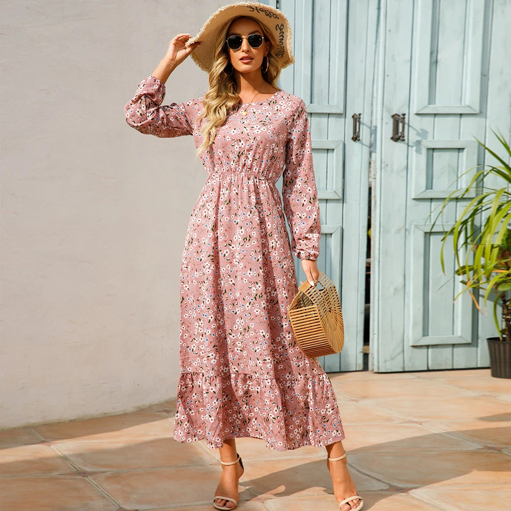 Robe maxi bohème imprimé floral, manches longues, idéale printemps-été.