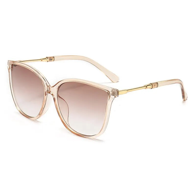 Lunettes de soleil vintage œil-de-chat pour femme – Design créateur rétro avec verres miroir, accessoire mode idéal pour la conduite.