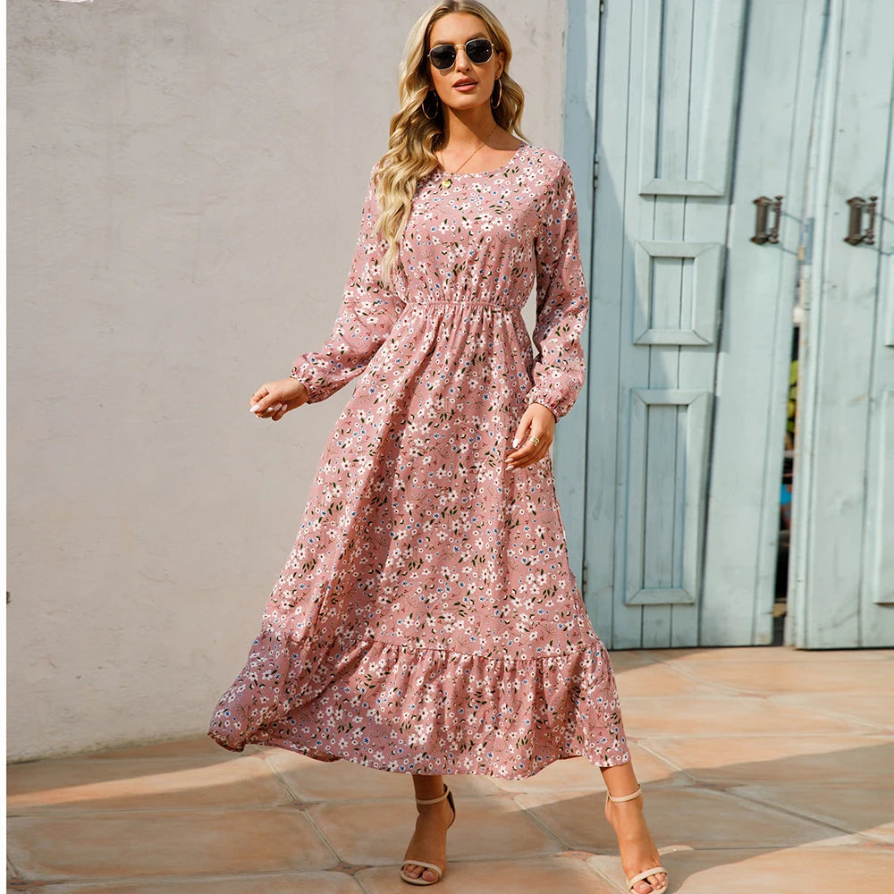 Robe maxi bohème imprimé floral, manches longues, idéale printemps-été.
