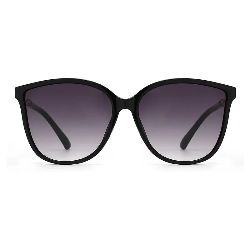Lunettes de soleil vintage œil-de-chat pour femme – Design créateur rétro avec verres miroir, accessoire mode idéal pour la conduite.