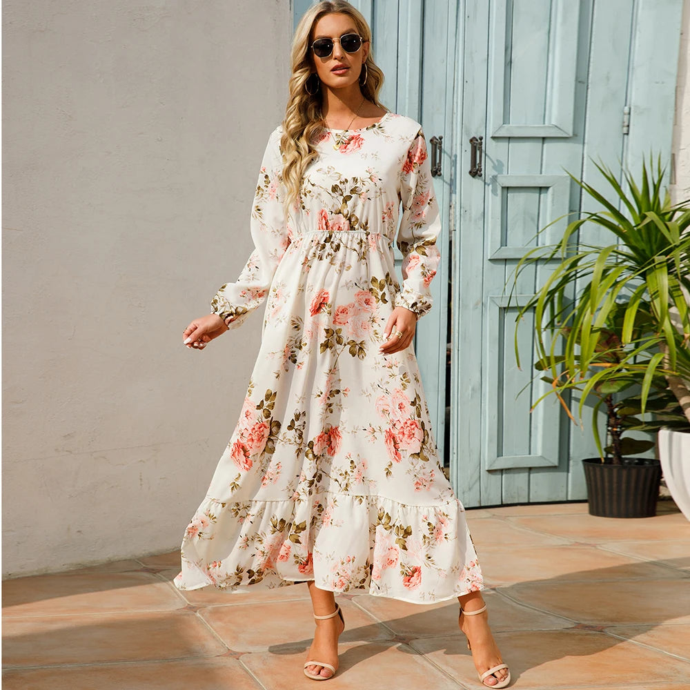 Robe maxi bohème imprimé floral, manches longues, idéale printemps-été.
