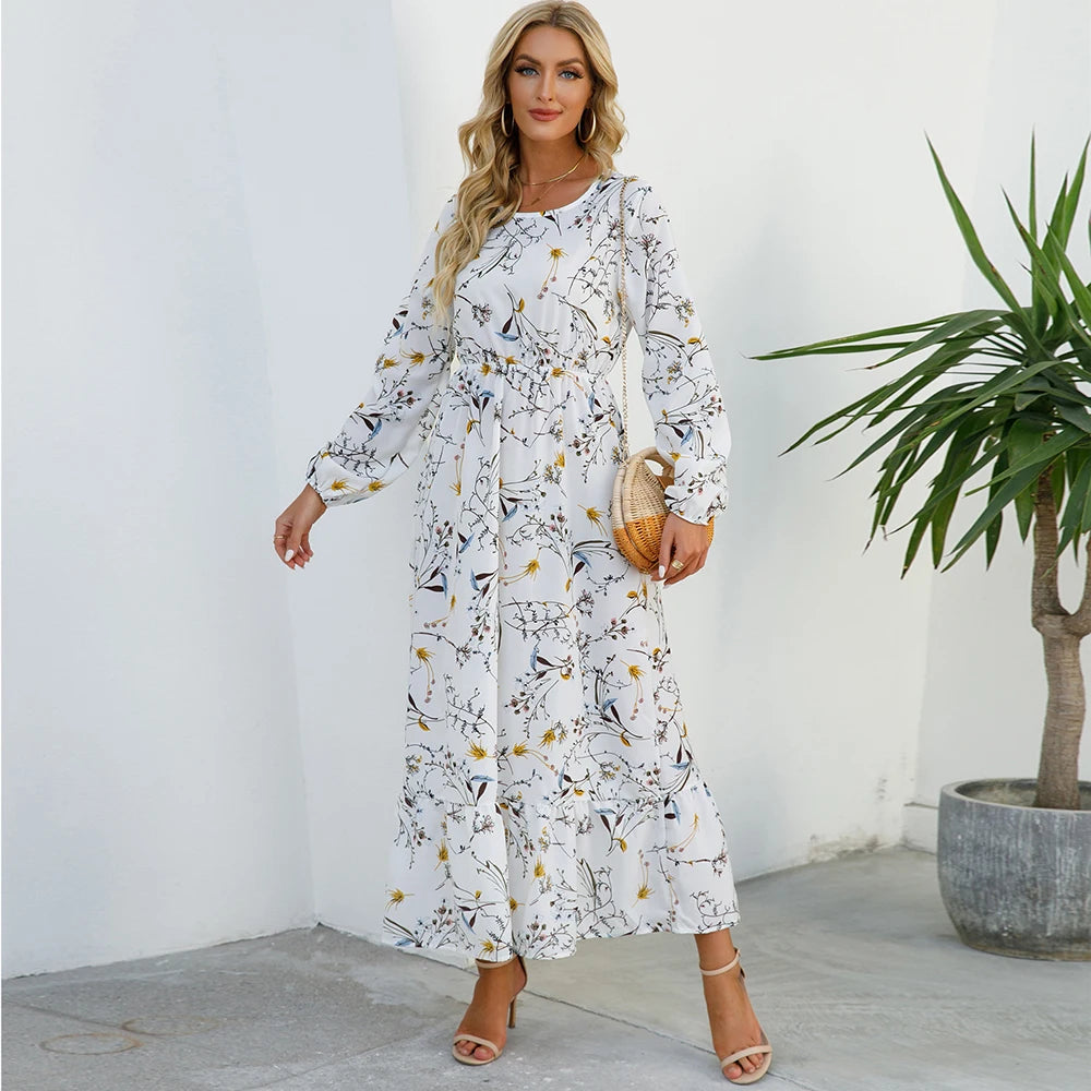 Robe maxi bohème imprimé floral, manches longues, idéale printemps-été.