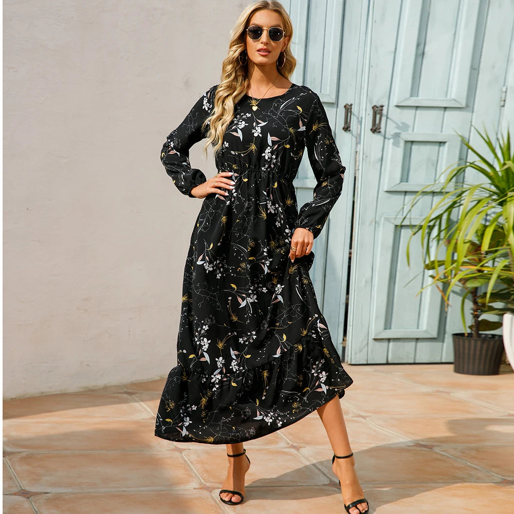 Robe maxi bohème imprimé floral, manches longues, idéale printemps-été.