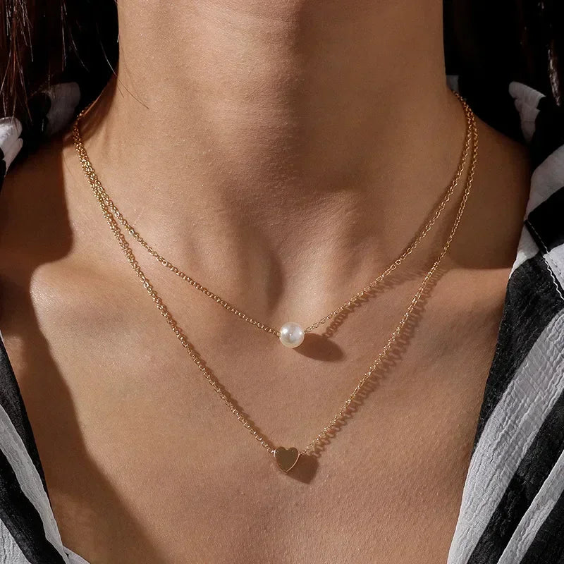 Nouveau collier perle pour femme 2025 – Style K-pop, couleur dorée, avec pendentif perlé, chaîne double couche type choker. Bijou de mode tendance gothique.