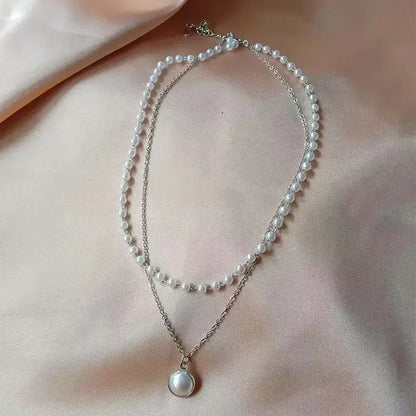 Nouveau collier perle pour femme 2025 – Style K-pop, couleur dorée, avec pendentif perlé, chaîne double couche type choker. Bijou de mode tendance gothique.