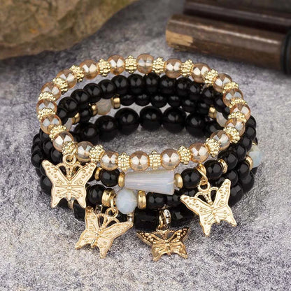 Lot de 4 bracelets tendance pour femme – Perles roses avec papillon, chaîne élastique, style bohème, parfait pour les fêtes et idées cadeaux