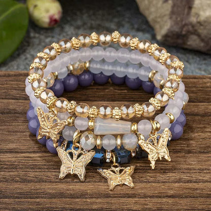 Lot de 4 bracelets tendance pour femme – Perles roses avec papillon, chaîne élastique, style bohème, parfait pour les fêtes et idées cadeaux