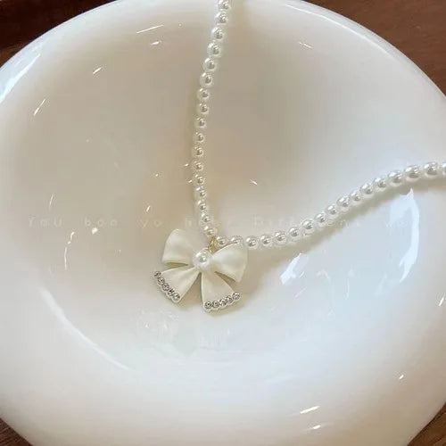 Nouveau collier perle pour femme 2025 – Style K-pop, couleur dorée, avec pendentif perlé, chaîne double couche type choker. Bijou de mode tendance gothique.