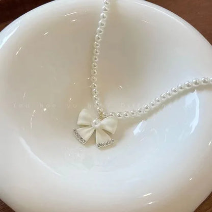 Nouveau collier perle pour femme 2025 – Style K-pop, couleur dorée, avec pendentif perlé, chaîne double couche type choker. Bijou de mode tendance gothique.