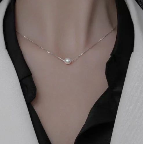 Nouveau collier perle pour femme 2025 – Style K-pop, couleur dorée, avec pendentif perlé, chaîne double couche type choker. Bijou de mode tendance gothique.